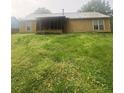 View of the backyard and screened in back porch at 3040 Garnet Way, Atlanta, GA 30349