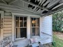Close-up view of the front porch, highlighting architectural details at 2880 Elizabeth Se St, Smyrna, GA 30080