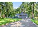 Charming two-story home with an attached garage and a well-maintained front yard at 3328 Hidden Bluff Trl, Snellville, GA 30039