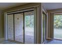 Living room featuring sliding glass doors offering natural light and views of the outdoor area at 3575 Oakvale Rd # 305, Decatur, GA 30034