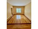 Bright living room with hardwood floors at 1435 Great Oaks Dr, Lawrenceville, GA 30045
