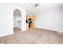 Spacious living room that flows to the kitchen offering a perfect setting for entertaining at 6010 Capitol Knl, Fairburn, GA 30213