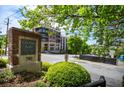Attractive signage for City View Lofts apartment building, nestled in lush green landscaping at 790 North Ne Ave # 209, Atlanta, GA 30306