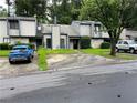 Street view of homes featuring well-maintained lawns, driveways and stylish, modern cars at 267 Toweridge Sw Dr, Marietta, GA 30064