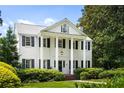 Charming exterior view of stately home with manicured front yard and large columns at 3415 Habersham Nw Rd, Atlanta, GA 30305