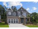 Charming two-story home featuring a stylish facade and inviting curb appeal at 4445 Beechnut Circle, Cumming, GA 30028
