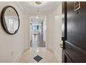 Inviting condo hallway entrance with elegant tile flooring and views into the condo's living spaces at 75 14Th Ne St # 3820, Atlanta, GA 30309