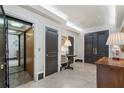 Foyer featuring an elevator, marble floors, and tastefully decorated with elegant furnishings at 2525 Peachtree Rd # 28, Atlanta, GA 30305