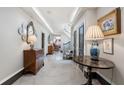 Inviting foyer with marble flooring, decorative accents, and an open view into the home at 2525 Peachtree Rd # 28, Atlanta, GA 30305