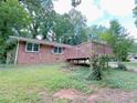 Brick home with lovely back deck and cozy outdoor space at 4103 Indian Creek Cir, Stone Mountain, GA 30083