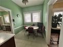 Cozy breakfast nook with white trim and large windows for natural light at 472 Parkway Ne Dr, Atlanta, GA 30308