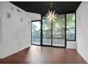 Bright and airy room with hardwood floors and large windows offering natural light and tree views at 855 Peachtree Ne St # 1108, Atlanta, GA 30308