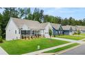 New construction homes with well-manicured lawns and sidewalks are a great place to call home at 51 Black Rock Rdg, Sharpsburg, GA 30277