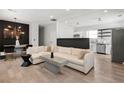 Spacious living room with hardwood floors and stylish contemporary decor at 1057 Fortress Sw Ave, Atlanta, GA 30315