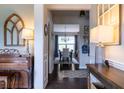 Elegant foyer with hardwood floors, decorative accents, and a view into the dining room at 2099 Lakeview Bend Way, Buford, GA 30519