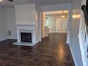 Inviting living room features hardwood floors, fireplace, and an open floor plan at 5570 Hampton Ct, Atlanta, GA 30349