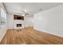 Spacious living room with hardwood floors and a cozy fireplace at 3123 Deshong Dr, Stone Mountain, GA 30087