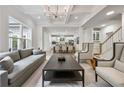 Bright living room with coffered ceilings, open floor plan, hardwood floors, and stylish decor at 3755 Valleyway Rd, Cumming, GA 30040