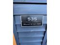 Close-up of 535 Walnut St. address plaque that includes the Est. 1920 year it was built at 535 Walnut St, Hapeville, GA 30354