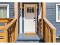 Inviting front door with sidelights and a 'HOME' welcome mat at 205 Maple St, Atlanta, GA 30354