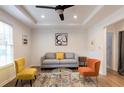 Inviting living room with modern decor, a plush sofa, and a decorative rug at 3198 Oakdale Rd, Atlanta, GA 30354