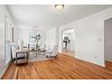 Inviting living room with hardwood floors, neutral decor, and plenty of natural light at 365 Norcross St, Roswell, GA 30075