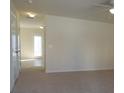 Inviting living room featuring neutral carpet, ample natural light, and smooth walls at 515 Brady Dr, Villa Rica, GA 30180