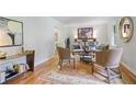 Cozy living room with hardwood floors, stylish seating, and decorative accents at 4345 Tucker North Dr, Tucker, GA 30084