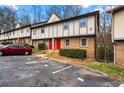 Street view of townhomes featuring brick facades and off-street parking at 1150 Rankin St # 6H, Stone Mountain, GA 30083