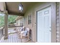 Inviting front porch with rocking chairs, perfect for relaxing outdoors at 4023 Anvil Block Rd, Ellenwood, GA 30294