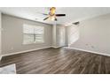 Open-concept living room with new flooring and natural light at 2479 Heatherton Ct, Dacula, GA 30019