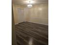 Bright room featuring wood floors, white trim and ample closet space at 6851 Roswell Rd # 15, Atlanta, GA 30328