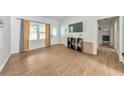 Bright living room with hardwood floors, large window and modern decor at 222 Bishop Ne Dr, Marietta, GA 30060