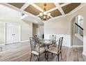 Spacious dining room with decorative ceiling, chandelier, and an open floor plan at 6298 Gothards Ln, Douglasville, GA 30134