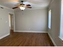 Bedroom with hardwood floors, neutral paint, ceiling fan and abundant natural light at 2367 Cascade Rd # B7, Atlanta, GA 30311