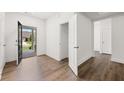 View of entryway with wood floor, door to the outside and closet at 55 Black Rock Rdg, Sharpsburg, GA 30277