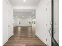 Bright foyer with hardwood floors that transitions to an open floor plan at 55 Black Rock Rdg, Sharpsburg, GA 30277