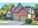 Elegant two-story brick home with a two-car garage and meticulously maintained lawn at 532 Mount Gerizim Se Rd, Mableton, GA 30126