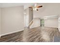 A spacious living room featuring hardwood floors, high ceilings, and plenty of natural light at 10545 Virginia Pine Ln, Alpharetta, GA 30022