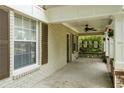 Inviting front porch with decorative columns, stained glass art, and ample space for outdoor seating at 1104 Victory Sw Dr, Atlanta, GA 30310