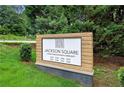 Well-maintained Jackson Square community sign on a lush green lawn at 3149 Buford Ne Hwy # 2, Atlanta, GA 30329