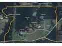 Aerial map of the acreage with labels for the log home and surrounding structures at 14501 Woolsey Rd, Hampton, GA 30228