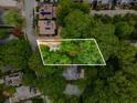 Aerial view showcasing the property's boundaries surrounded by lush greenery at 1200 Mansfield Ne Ave, Atlanta, GA 30307