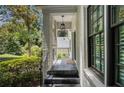 Charming front porch with painted brick, slate flooring, and stylish pendant lighting at 1833 N Rock Springs Ne Rd, Atlanta, GA 30324