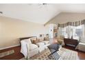 Comfortable living room with a vaulted ceiling and plush seating area at 5069 Kathryn Glen Dr, Acworth, GA 30101