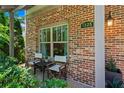Charming brick front porch with seating area, perfect for relaxing at 1325 Oakview Rd, Decatur, GA 30030
