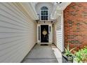 Inviting entrance features a stylish front door with decorative wreath at 3064 Baymount Way, Lawrenceville, GA 30043