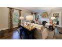 Comfortable living room showcasing a fireplace, sofa and hardwood flooring at 2811 Alpine Ne Rd, Atlanta, GA 30305