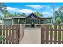 Charming home with fenced front yard, covered porch and inviting entry at 161 Old Vandiver Dr, Canton, GA 30114