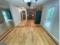 Open-concept kitchen view boasting stainless steel appliances and an open flow to other rooms at 48 Glenhaven Ct, Douglasville, GA 30134